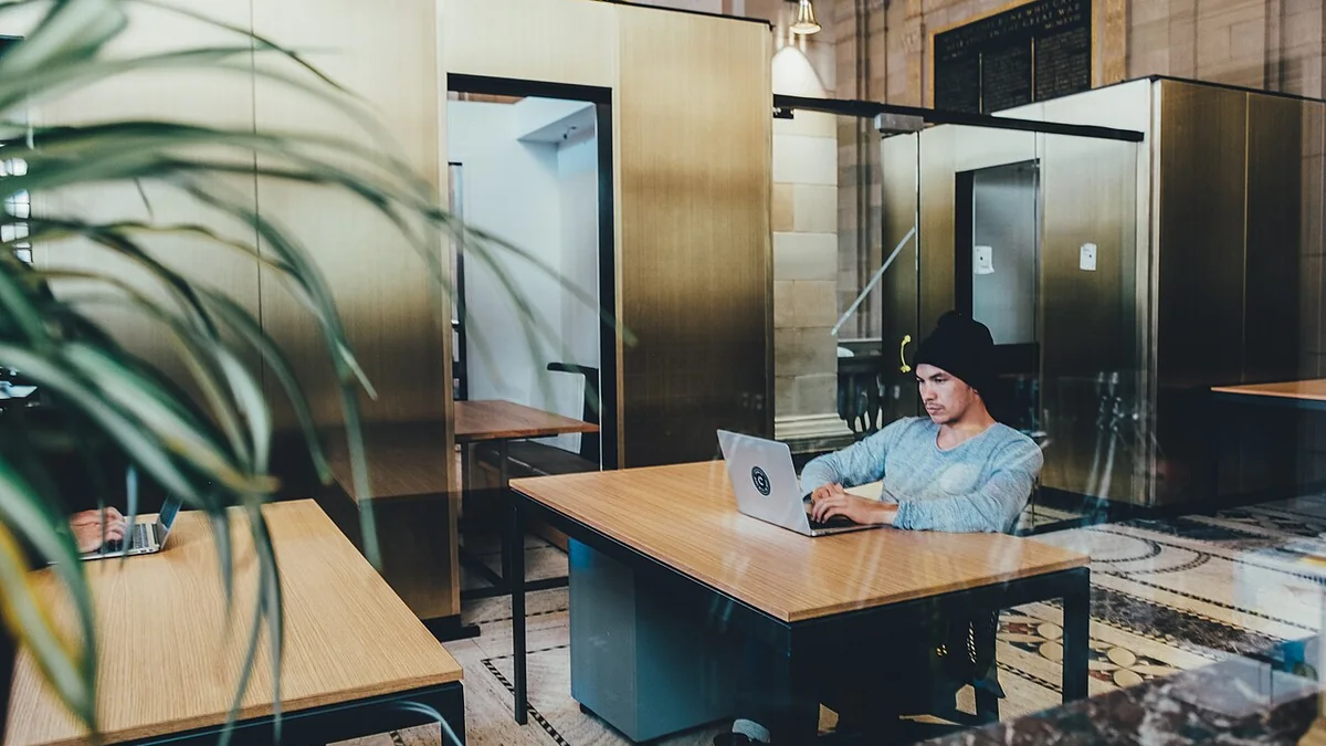 Employees using an internal AI assistant connected to company documents